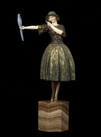 Indiscreet, cold-painted, parcel-gilt and silver bronze with patina, carved and tinted ivory on onyx base 16,9 x 8,3 x 4,7 in. / 43 x 21 x 12 cm.