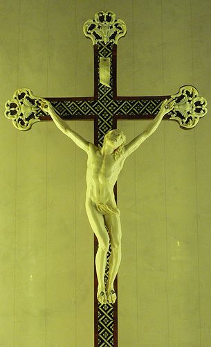 Crucifix Ivory on wood and metal cross